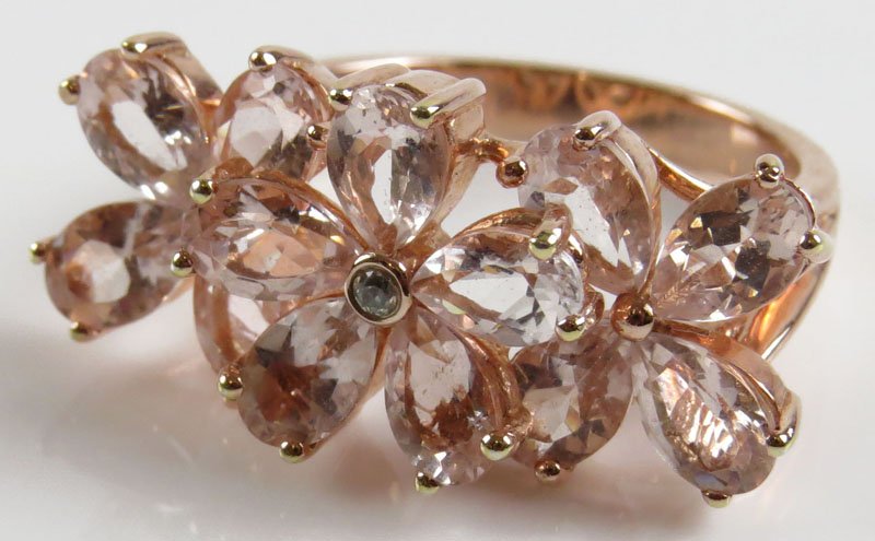 Pink Tourmaline, Diamond and 14 Karat Rose Gold Vermeil: Pink Tourmaline, Diamond and 14 Karat Rose Gold Vermeil Sterling Silver Ring, Size 7. Signed 925 and DD Makers Mark. Good Condition. Weighs 3.40 Pennyweights. Shipping $20.00