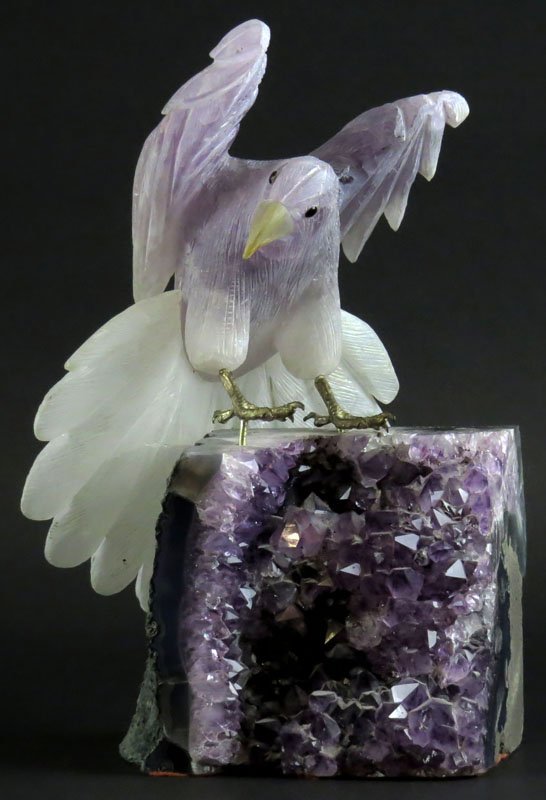 20th Century Carved Amethyst Bird Sculpture Mounted on: 20th Century Carved Amethyst Bird Sculpture Mounted on Amethyst Geode. Unsigned. Good Condition or Better. Measures 11-1/2 Inches Tall and 7-1/2 Inches Wide. Shipping $125.00