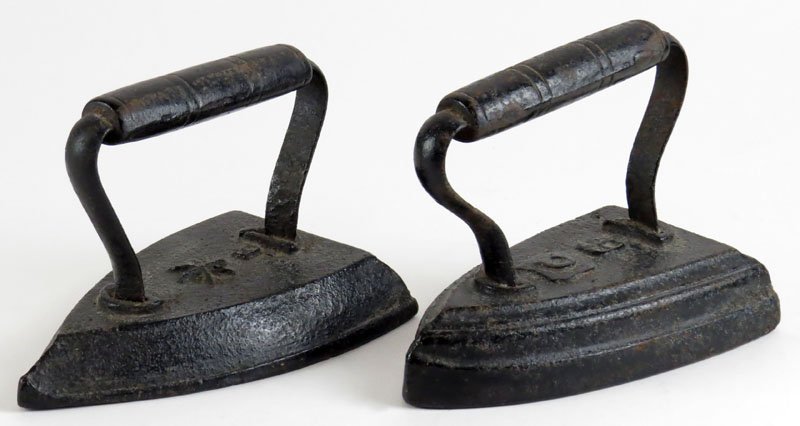 Two (2) Antique Irons Painted Black. Each with Numerals: Two (2) Antique Irons Painted Black. Each with Numerals and One (1) with Star the Other with Letter. Good Condition. Heavy. Measures 4 Inches Tall and 6-1/4 Inches Long. Shipping $33.00