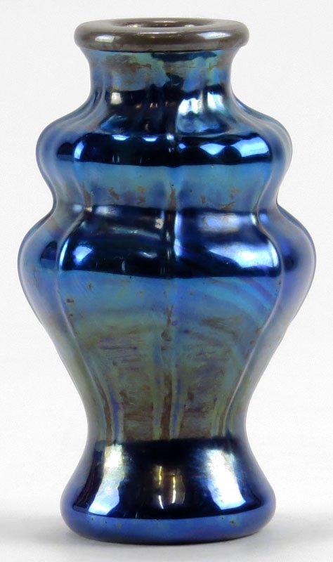 Tiffany and Company Favrile Miniature Blue Aurene Style: Tiffany and Company Favrile Miniature Blue Aurene Style Art Glass Vase with Sterling Silver Rim. Ground and Polished Pontil. Signed LCT, Favrile and 9897E. Measures 3-1/4 Inches Tall. Firing Crack Und