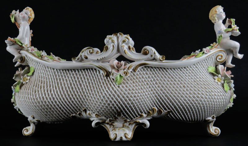 Capodimonte Porcelain Centerbowl with Floral: Capodimonte Porcelain Centerbowl with Floral Decoration. Signed. Good Condition, May Have Small Losses. Measures 6-1/2 Inches Tall and 15-3/4 Inches Long. Shipping $48.00