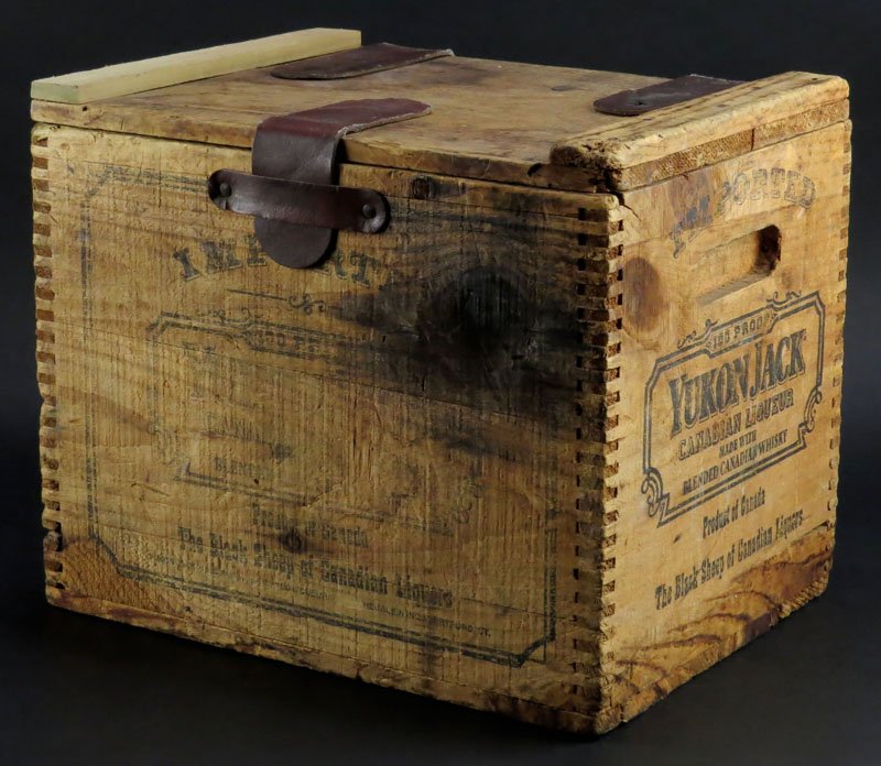 Vintage Yukon Jack Canadian Liquor Whiskey Crate. Wear: Vintage Yukon Jack Canadian Liquor Whiskey Crate. Wear from Age, Discoloration. Measures 12 Inches, 14-1/2 Inches by 11 Inches. Shipping $80.00