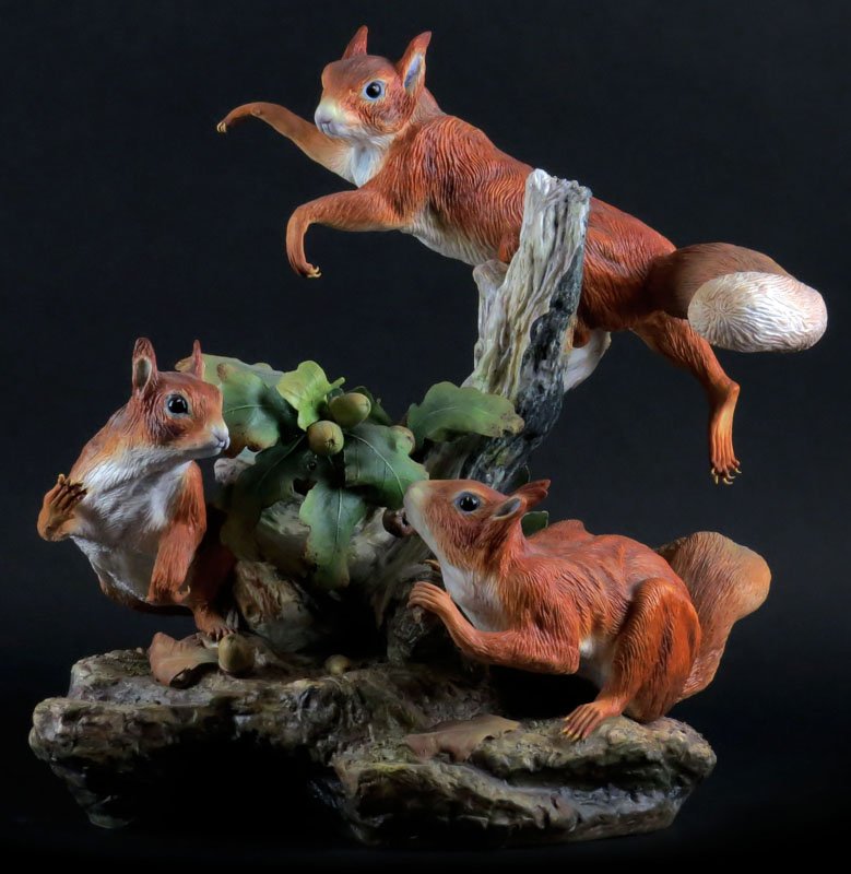 Boehm Limited Edition Porcelain Sculpture Depicting: Boehm Limited Edition Porcelain Sculpture Depicting Three (3) Squirrels. Signed. One (1) Leaf with Partial Loss or else Good Condition. Measures 13-1/2 Inches Tall and 12-1/2 Inches Wide. We Will Not 