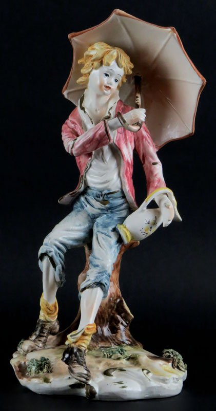 Early 20th Century Capodimonte Porcelain Figure "Boy: Early 20th Century Capodimonte Porcelain Figure "Boy With Umbrella" Figure. Signed, Stamped. Good Condition. Measures 13 Inches Tall and 7 Inches Wide. Shipping $32.00