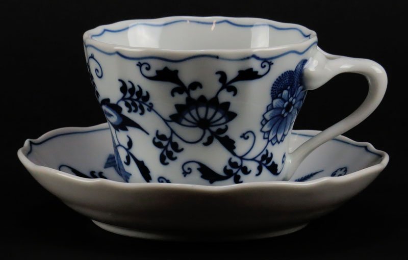 Eight (8) Blue Danube Japan Porcelain Cups and Matching: Eight (8) Blue Danube Japan Porcelain Cups and Matching Saucers. Signed. Normal Wear from Use or else Good Condition. Cups Measure 2-5/8 Inches Tall and 4-1/2 Inches Long. Saucers 5-1/2 Inches Diamete