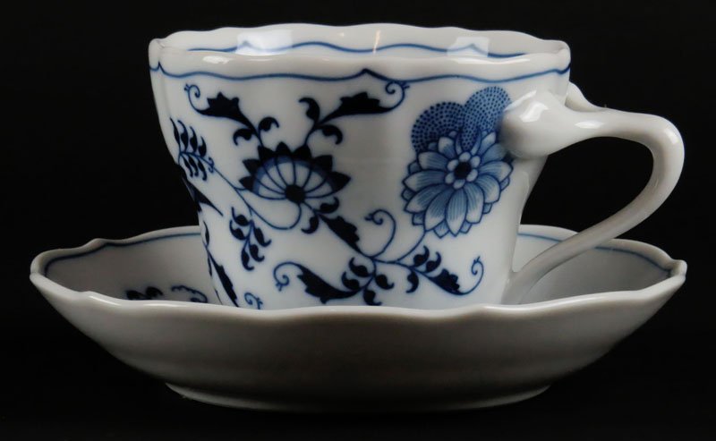 Seven (7) Blue Danube Japan Porcelain Cups and Seven: Seven (7) Blue Danube Japan Porcelain Cups and Seven (7) Matching Saucers. Signed. Normal Wear from Use or else Good Condition. Cups Measure 2-5/8 Inches Tall and 4-1/2 Inches Long. Saucers 5-1/2 Inch
