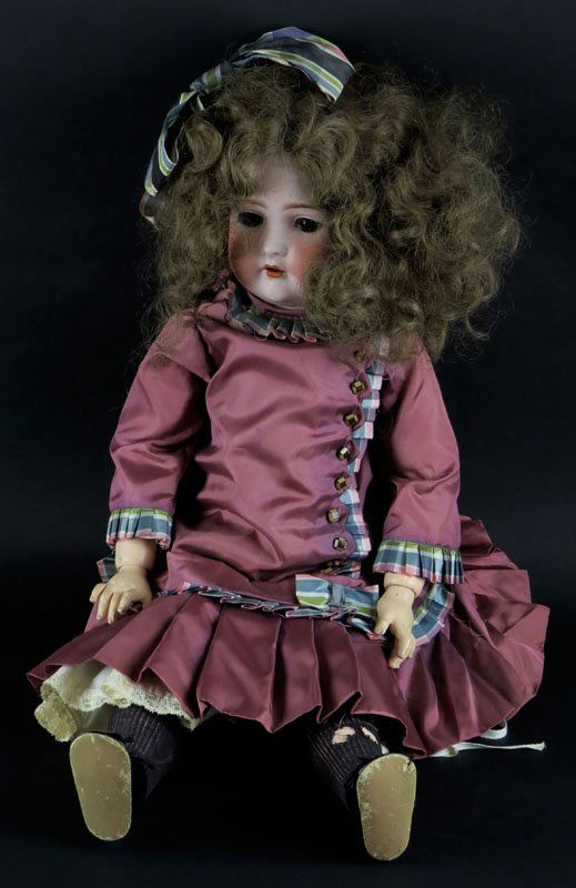 Early 20th Century Bruno Schmidt BSW with Hair, Glass: Early 20th Century Bruno Schmidt BSW with Hair, Glass Eyes, Porcelain Head and Composition Body. Signed BSW and Made in Germany. Damage to Fingers or else Good Condition. Measures about 26 Inches Long