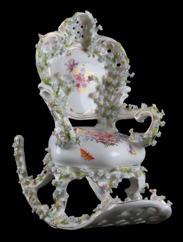 Vintage Ornate Dresden Style German Porcelain Miniature: Vintage Ornate Dresden Style German Porcelain Miniature Rocking Chair. Signature Illegible. Good Condition. Measures 6 Inches Tall and 6-1/2 Inches Long. Shipping $20.00