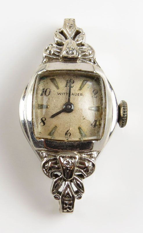 Wittnauer Art Deco Period 14 Karat White Gold and: Wittnauer Art Deco Period 14 Karat White Gold and Diamond Ladies Watch. No Strap. Not Running. Good Physical Condition. The Gallery does Not warranty the running condition of watches. Weighs 5.60 Penn