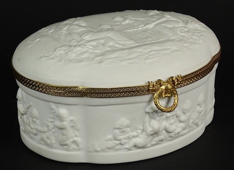 Vintage Limoges Bisque Brass Mounted Vanity Box.: Vintage Limoges Bisque Brass Mounted Vanity Box. Classic Scenes in Relief. Signed Limoges France. Good Condition. Measures 3-1/2 Inches Tall, 8 Inches Length. Shipping $30.00
