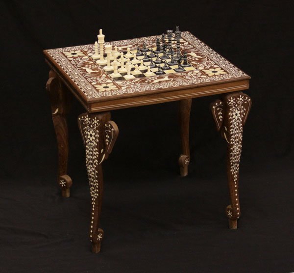 Vintage Indian Bone Inlaid and Rosewood Chess Table: Vintage Indian Bone Inlaid and Rosewood Chess Table with Carved Elephant Shaped Figures to Legs. Some Discoloration and Cracking to Top or else Good Condition. Measures 20 Inches Tall by 19-1/2 Inches