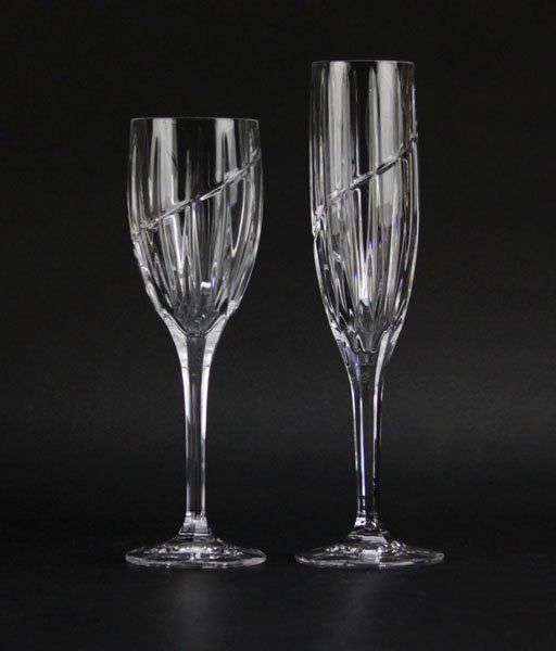 Box Lot of Matching Crystal Champagne Flutes and Wine: Box Lot of Matching Crystal Champagne Flutes and Wine Glasses. Unsigned. Good condition. Largest Glasses Measures 9-1/2 Inches High. Shipping $50.00