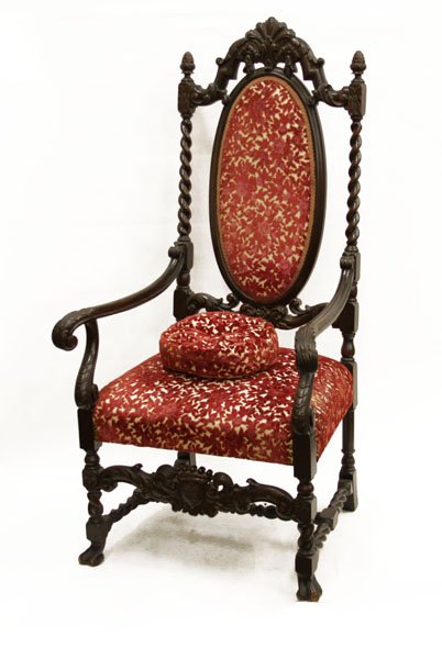 Antique Spanish Style Carved Wooden and Upholstered Arm: Antique Spanish Style Carved Wooden and Upholstered Arm Chair with Spindle. Small Pillow Included (Some Spotting). Chips to Front Feet or else Good Condition. Measures 53" H by 28" W. We Will Not Ship