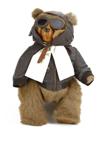 teddy bear with wooden face