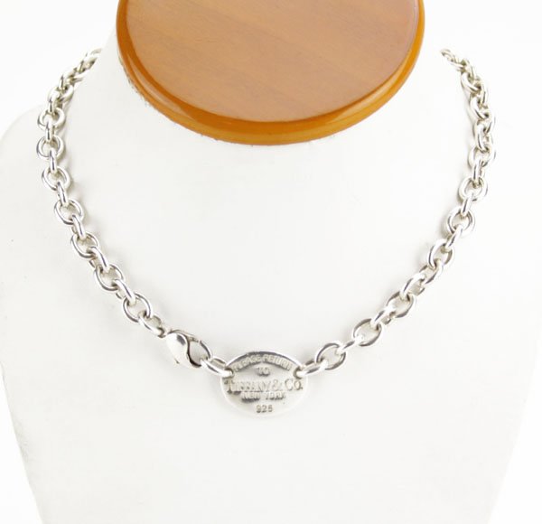 Sterling Choker Necklace with Tiffany and Co Name Tag.: Sterling Choker Necklace with Tiffany and Co Name Tag. Good Condition. Measures 16" Long. Weighs Approx. 48.6 Grams. Shipping $20.00