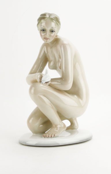 Vintage Giovanni Ronzan Nude Holding Bird Glazed Porcel: Vintage Giovanni Ronzan Nude Holding Bird Glazed Porcelain Figurine. Signed to Base. Repair to Bird Tail. Measures 16" H by 7" W. We Will Not Ship This Item but will Happily Provide A List of Outside 