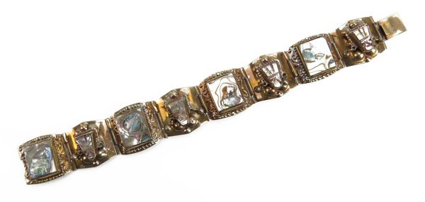 Sterling Silver Bracelet with Abalone Inlay. Stamped: Sterling Silver Bracelet with Abalone Inlay. Stamped 925. Some Minor Tarnish or else Good Condition. Measures 7-1/4" Long. Shipping $20.00