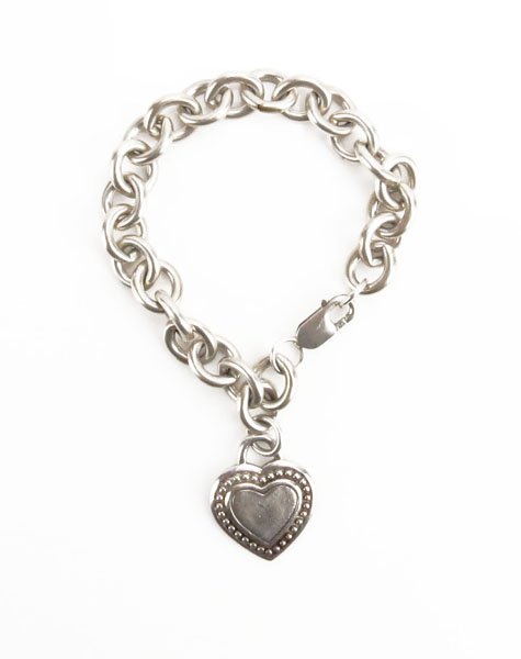 Judith Ripka Sterling Silver Bracelet with Heart Shaped: Judith Ripka Sterling Silver Bracelet with Heart Shaped Tag. Stamped to Tag. Measures 8" Long. Weighs Approx. 32.7 Pennyweights. Shipping $20.00