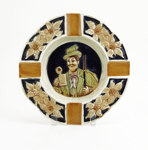 Vintage Cigar Ashtray with Man Holding Beer Stein Relie: Vintage Cigar Ashtray with Man Holding Beer Stein Relief. Numbered 58/601. Good Condition. Measures 10" in Dia. Shipping $30.00