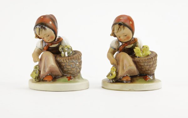 Two (2) Hummel Chick Girl Porcelain Figurine. Number 57: Two (2) Hummel Chick Girl Porcelain Figurine. Number 57/0. TMK Mark to Base. Good Condition. Measures Approx. 4" H by 3-1/4" W. Shipping $20.00