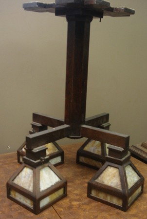 MISSION OAK Arts & Crafts Chandelier: Oak and slag glass chandelier with four oak framed slag glass shades. Unsigned, maker unknown. Possible Stickley Bros or Shop of the Crafters. 27" wide, 32" tall.