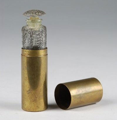 Rare Lalique Perfume for Forvil w/ Bronze Case Ori: Glass perfume by Lalique for Forvil with remnands of original label and bronze travel case.Cloar glass with blk patina. 3-5/8" H . Case 3-7/8".