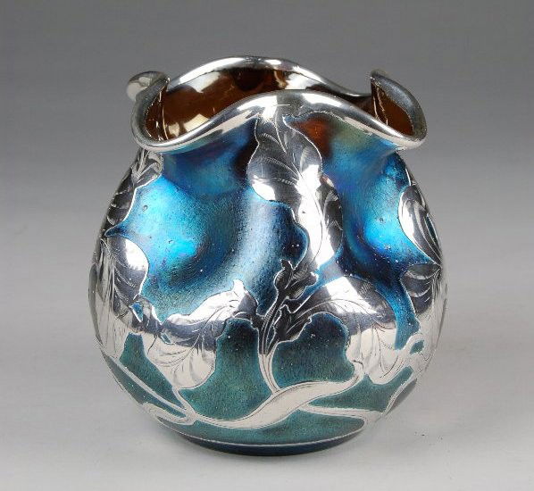 Loetz Silver Overlay Vase: Loetz Silver Overlay Vase. Beautifully overlaid with silver, heavily iridized in deep electric blue all over brown base glass. Selling as-is, see condition.