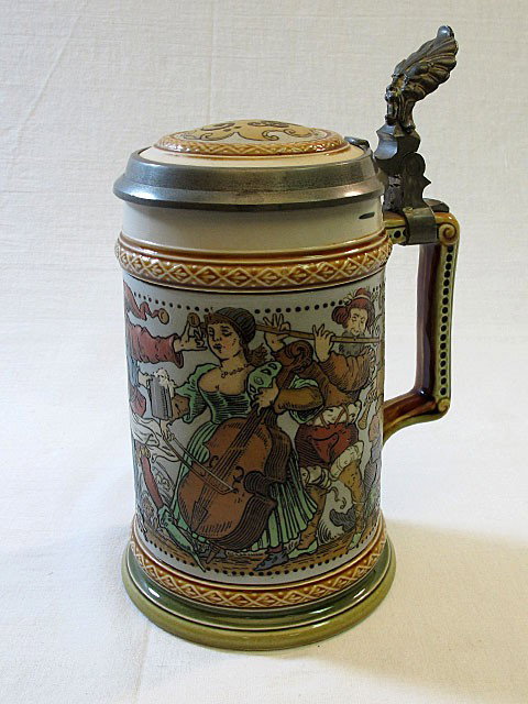 Incised Mettlach Stein #2094: Mettlach stein # 2094, .5L, merry makers and musicians. Inlay lid. 8".