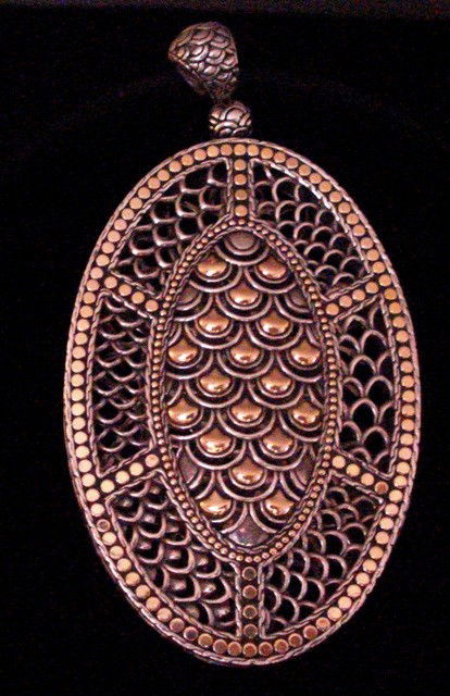 Large John Hardy Naga Pendant: John Hardy Naga pendant, 4 1/4" x 2 1/4". Sterling silver with 18k gold accents.