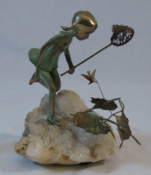 Malcolm Moran Bronze Figural Sculpture: Malcolm Moran bronze sculpture on crystal. Height 6". Girl chasing butterflies with net.