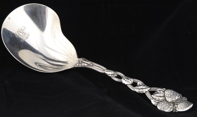 Sterling Tiffany Strawberry Serving Spoon: Sterling silver Tiffany & Co. strawberry/casserole server with kidney shaped bowl. Monogram. 3.87 oz t, 10".