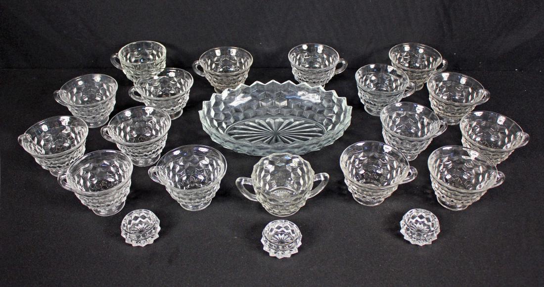 21 Pcs. Fostoria American Pattern Glassware: 21 Pcs. Fostoria American Pattern Glassware Including 17 Cups, 3 Salt Cellars and Relish Dish.