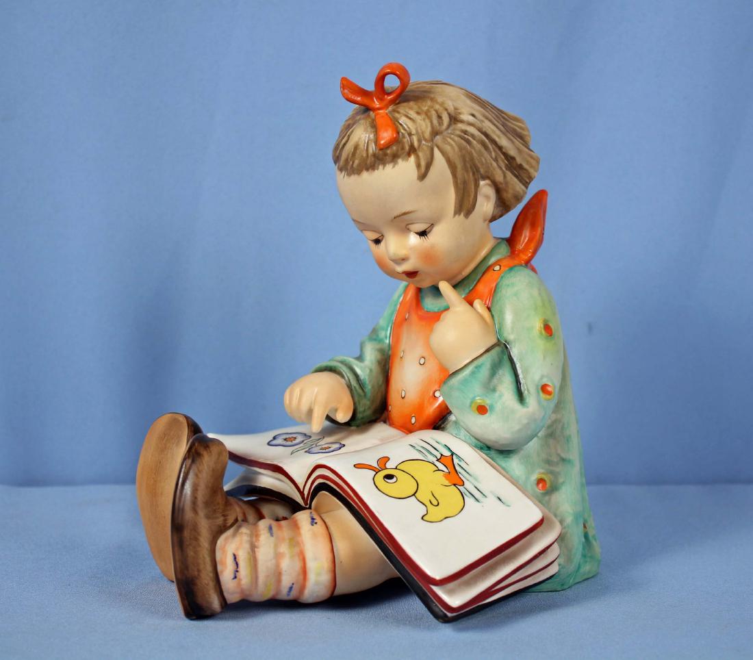 Hummel 3/11 "Bookworm" 8 1/2" H. Figure by Goebel: Hummel 3/11 "Bookworm" 8 1/2" H. Figure by Goebel. The MKK-5 Hummel is marked 1972 on base. Figure measures 8" to top of head and almost 9" to to top of hair bow.