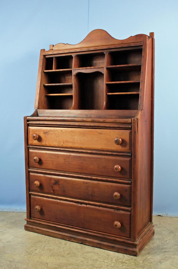 19th C. Cherry Southern Store Clerk Standing Desk: 19th Century Cherry and Mixed Woods Southern Store Clerk Standing Desk. A Wonderful and Unusual Southern Piece with a Truly Unique Form having Four Drawers Below Pigeon Hole Section. Bottom of Bottom 