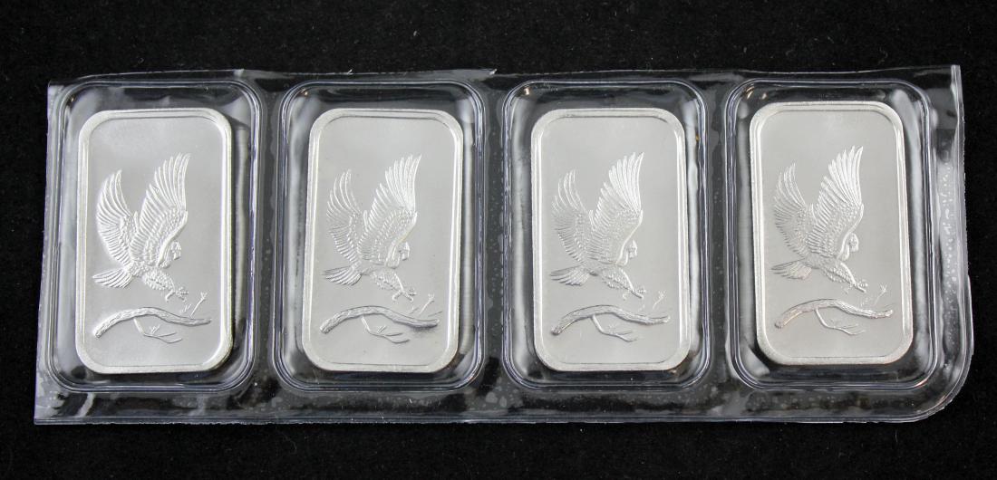 Four (4) one ounce .999 silver bars (1 of 3)