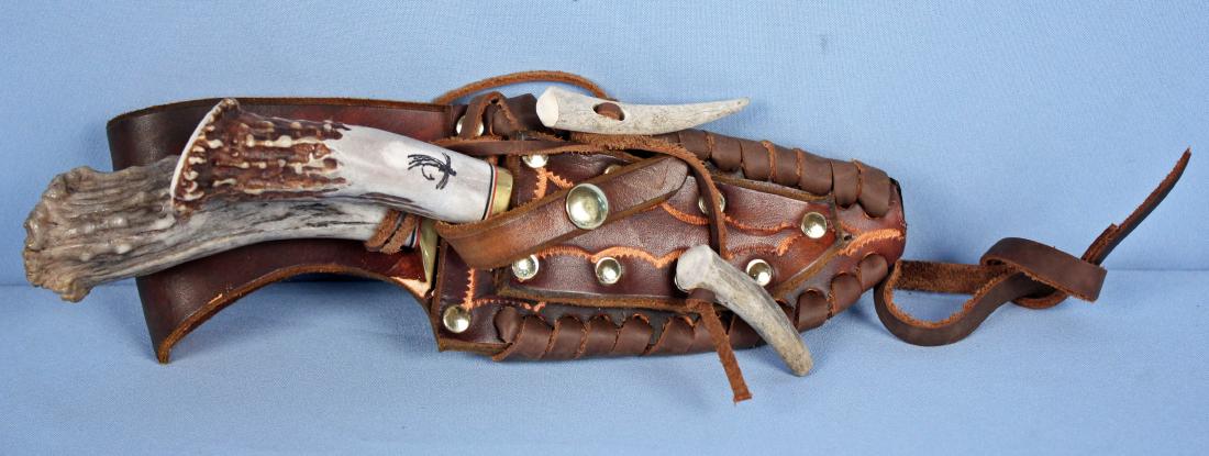 Two Ken Richardson Knives w/ Stag Handles: Two Ken Richardson Knives with Stag Handles and double sheath. Set comes with (1) Signed KR-17 hunting knife with 5 1/2" blade, 1085 spring steel 85% carbon tempered to blue spring steel. Handle is ge