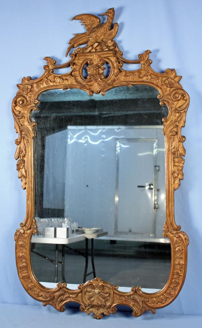 French Style Rococo Mirror with Eagle: French Style Rococo Mirror with Eagle. Probably made in the 1930's. The gesso and wood mirror measures approx. 29" Wide X 50" High.