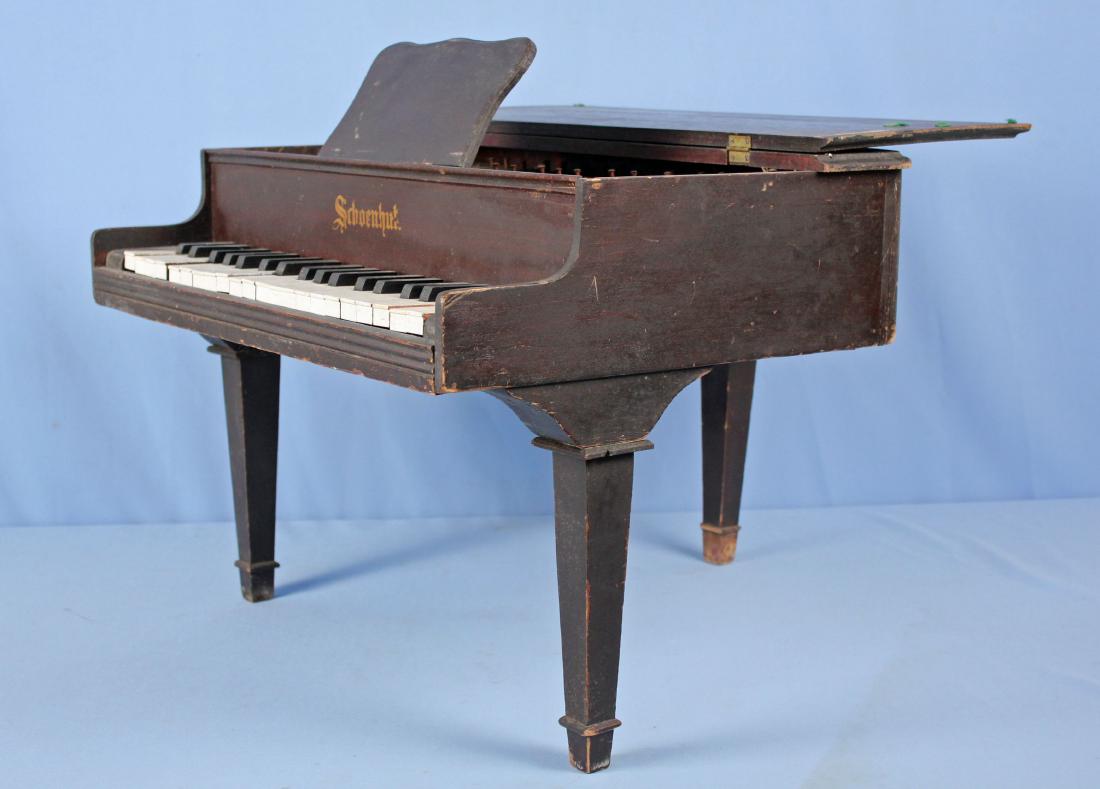 Schoenhut Toy Wooden Baby Grand Piano: Schoenhut Toy Wooden Baby Grand Piano. Measures 17 3/4" High X 24 1/2" Wide X 26 1/2" Deep.