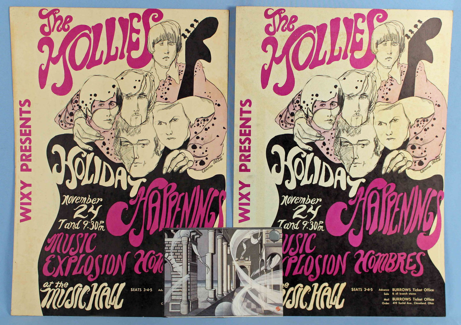 2 Original The Hollies Concert Posters 1960: Two Original The Hollies Concert Posters 1960'S - 1970'S. Posters artwork by Dennis Abbe (1942-2012). Abbe was a student of Erte. Abbe helped create the Art Deco District in Miami Florida. Posters mea