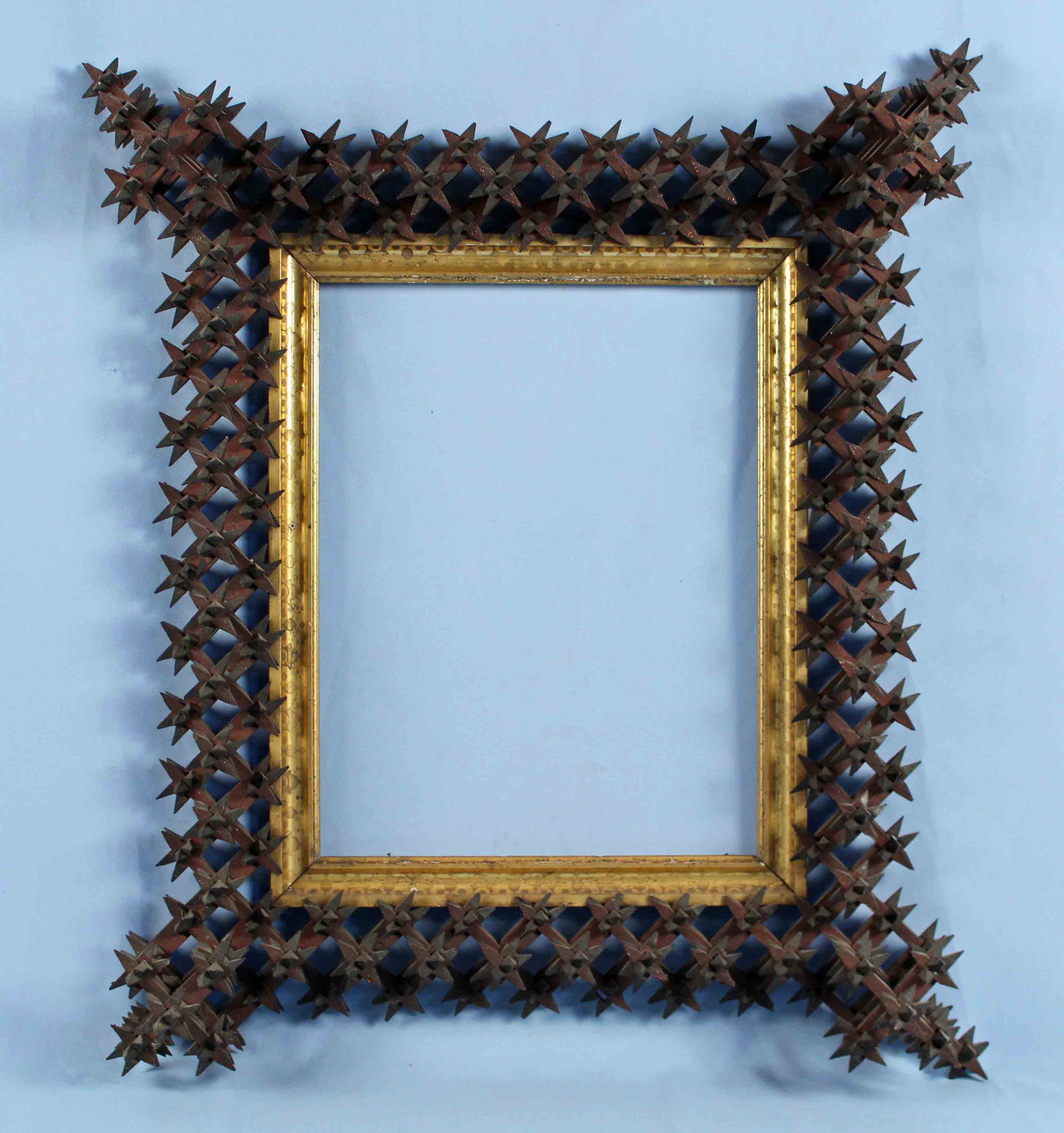 Large Tramp Art "Crown of Thorns" Frame: Large Tramp Art "Crown of Thorns" Walnut Frame Circa 1900. Frame measures Approx 14" X 19" and overall 26 1/2" X 31". Condition - Very good condition with some wear to gold gilt.