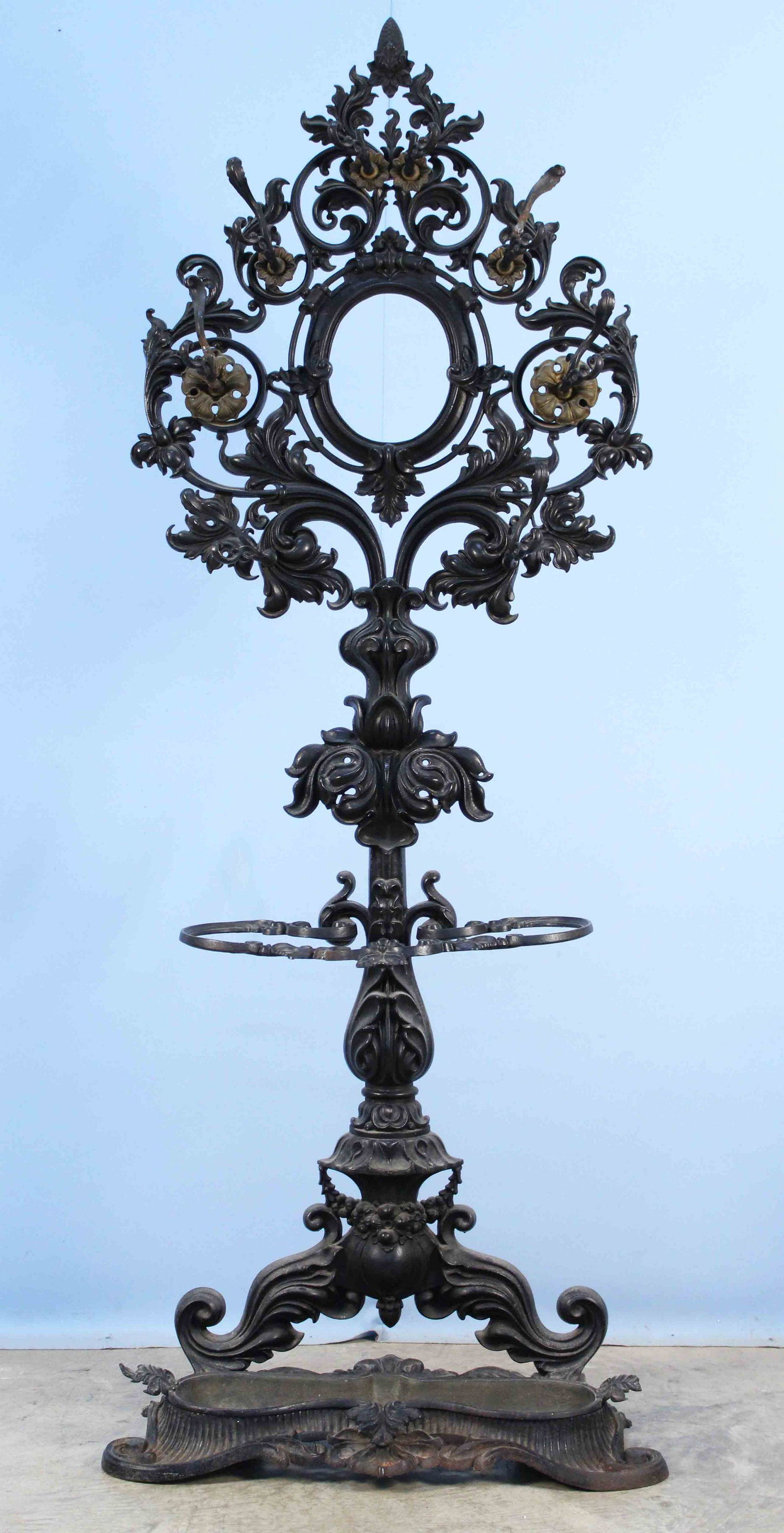 1852 Rococo Cast Iron Halltree: 1852 Rococo Cast Iron Halltree. Halltree cast iron drain pan is signed, "MGreenwood & Co. Patent 1852." Provenance William B. Wilkinson M.D. Petersburg, Virginia and La Grange, Tennessee and Wilkinson