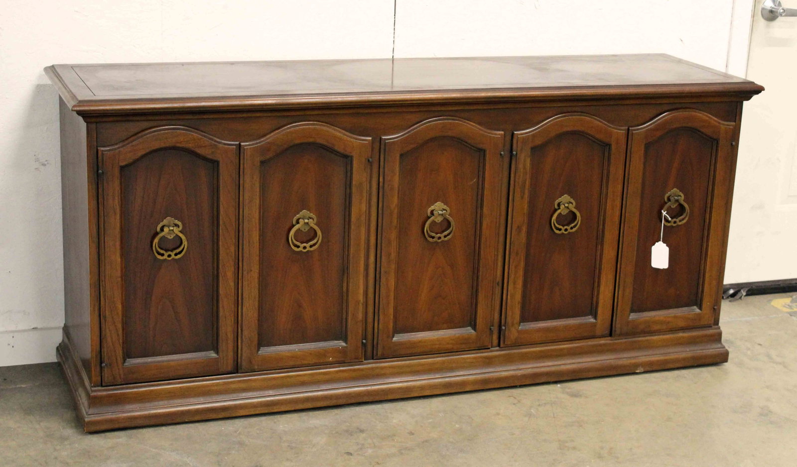 Drexel Mid Century Walnut Credenza: Drexel Mid Century Walnut Credenza. Has six doors with four inner drawers. Measures 30" high X 68" long X 19" deep. Condition - Credenza has old finish and needs cleaning/polishing. See photos.