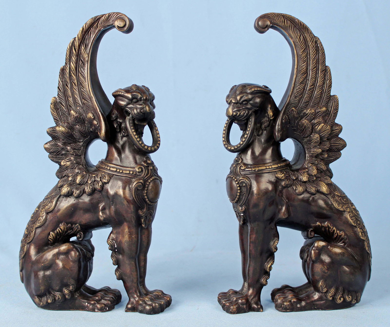 Pair of Contemporary Bronze Griffin Sculptures: Pair of Contemporary Bronze Griffin Sculptures.The griffins are most likely Maitland-Smith and were manufactured in China or the Philippines. The sculptures weigh approx. 7 Lbs. 5.2 Oz. each.Measure 1