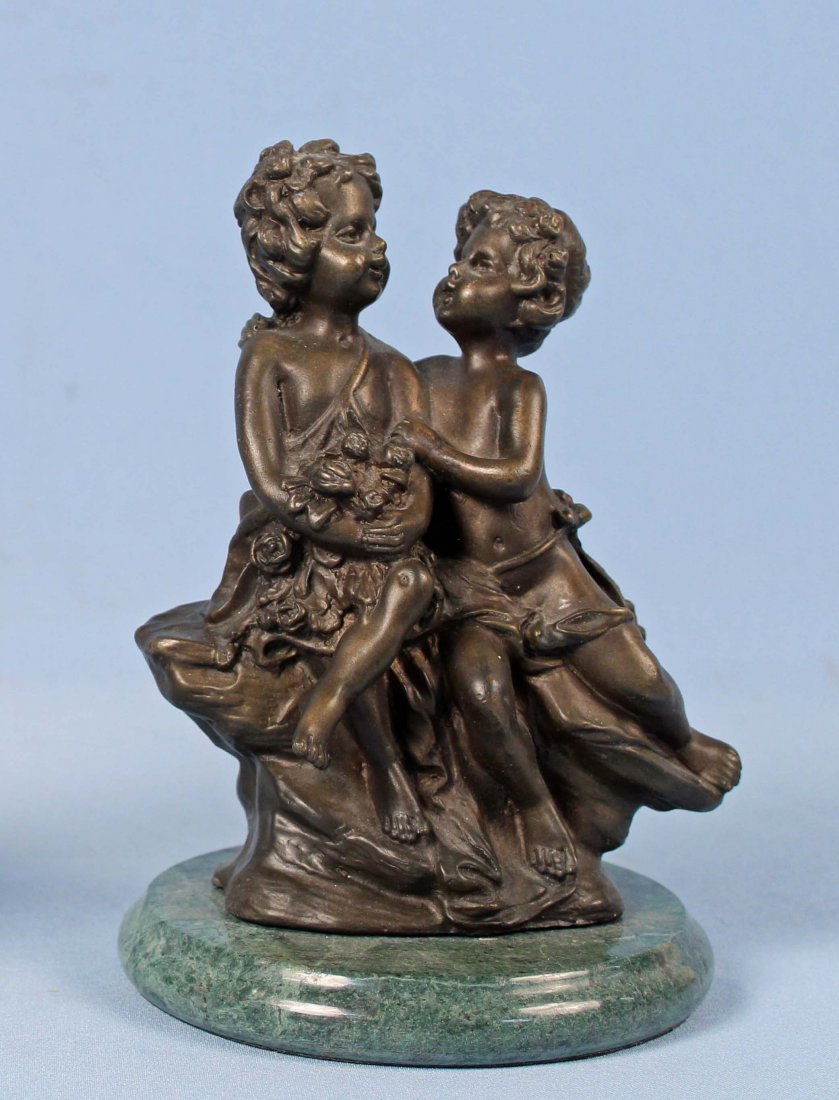 Bronze Sculpture After Auguste Moreau (1834-1917): 20th C. Bronze Sculpture After Auguste Moreau (1834-1917). Two seated Putti with roses on a green marble base signed. Measures 7 3/4" High Condition - Good condition.