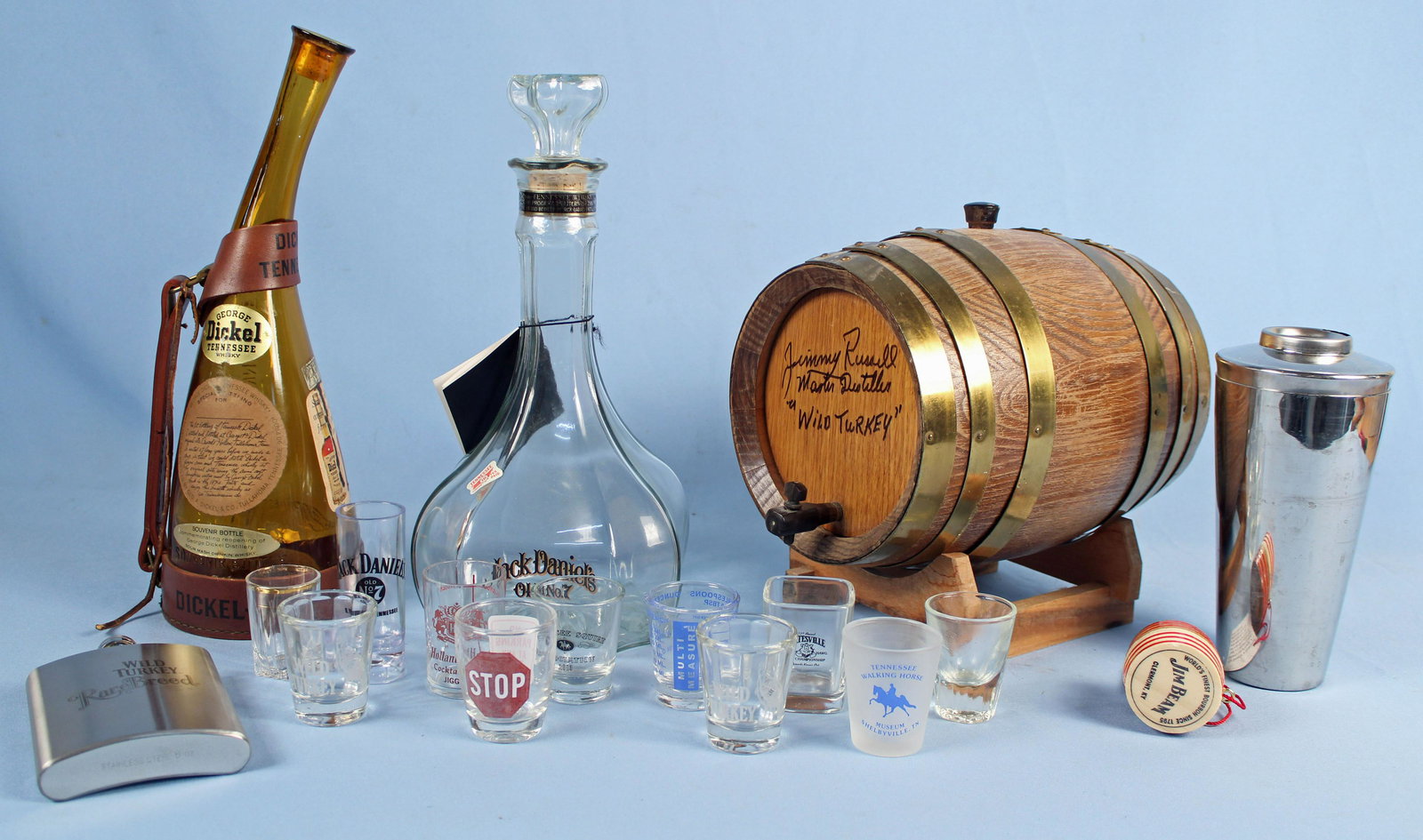 Group of Liquor Items, Wild Turkey Keg, Shot Glass: Group Liquor Items, Wild Turkey Keg, Shot Glasses, Jack Daniels Decanter, Wild Turkey Flask Etc. The Wild Turkey keg is signed by master distiller "Jimmy Russell" Condition - Good condition.