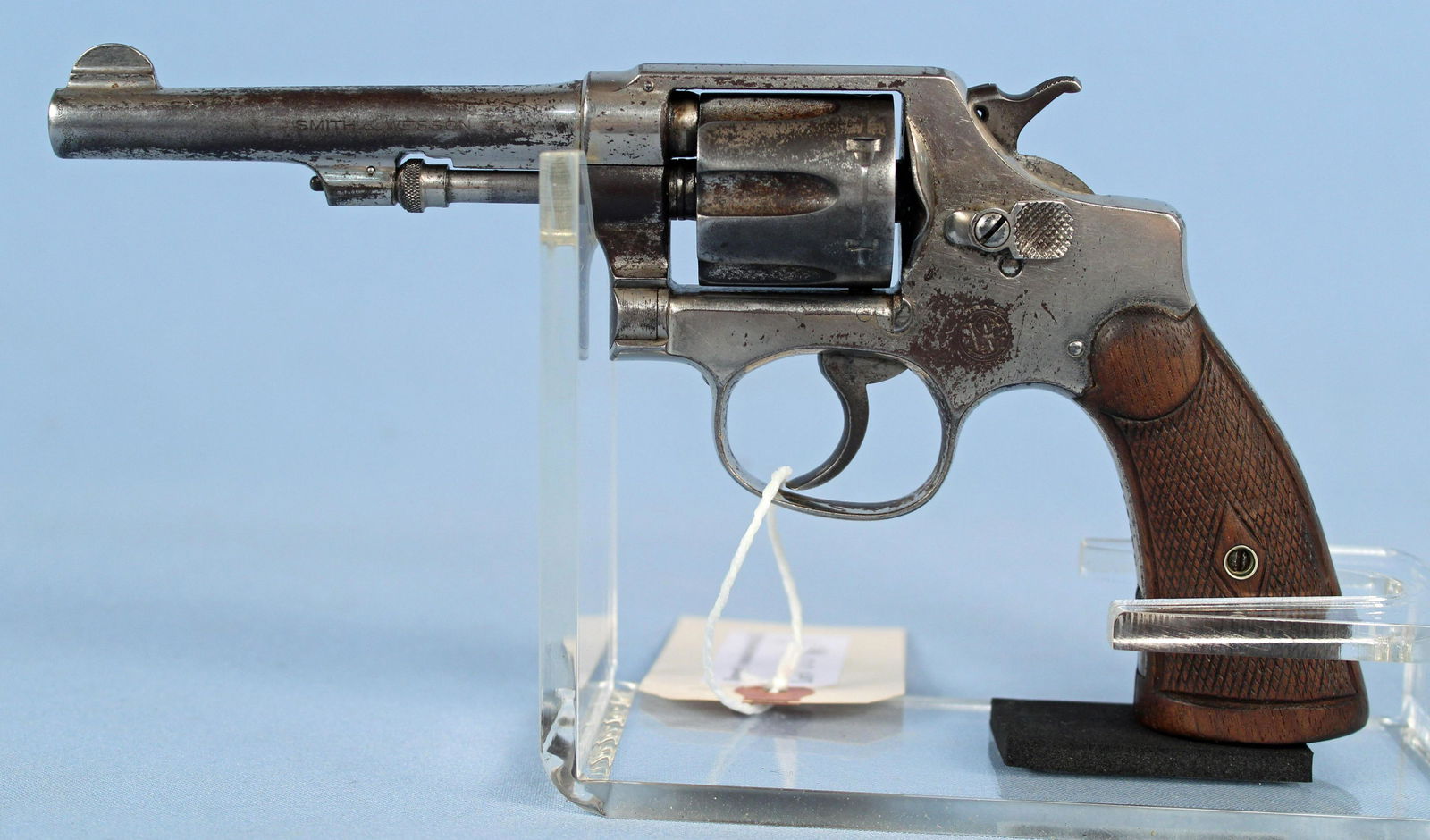 Smith & Wesson Model 3 .32 S&W Long Revolver: Smith & Wesson Model 3 .32 S&W Long Hand Ejector Revolver. S#- 445802. Barrel measures 4 1/4" long. READ OUR TERMS & CONDITIONS PRIOR TO BIDDING ON THIS FIREARM. SOME BIDDERS AND STATES ARE PROHIBITED