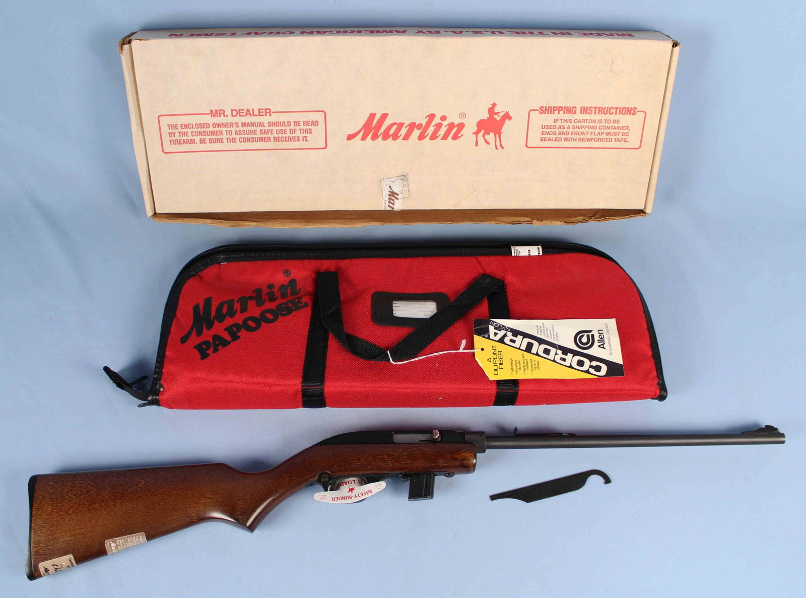 Marlin 70P Semi-Auto .22 LR Rifle: Marlin 70P Semi-Auto .22 LR Rifle. S#- 11311334. Barrel measures 16 1/4" long. Rifle comes with 7 shot magazine, Marlin Papoose case, and original box. READ OUR TERMS & CONDITIONS PRIOR TO BIDDING ON 