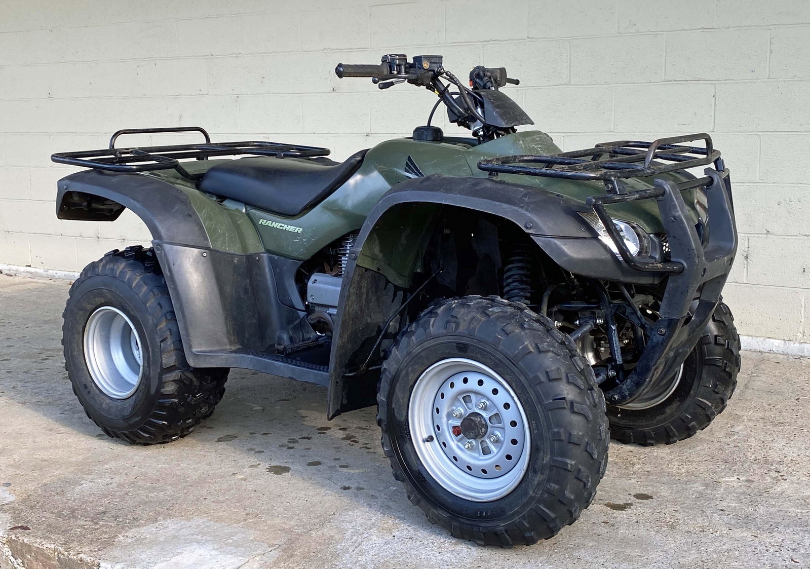 2004 Honda Rancher 2x4 Four Wheeler: 2004 Honda Rancher 2x4 Four Wheeler. Comes with a Badland 2,500 LBS. ATV wrench. Condition- Four wheeler was cranked and ran well. This four wheeler will need a new battery and fuel line replacement. 