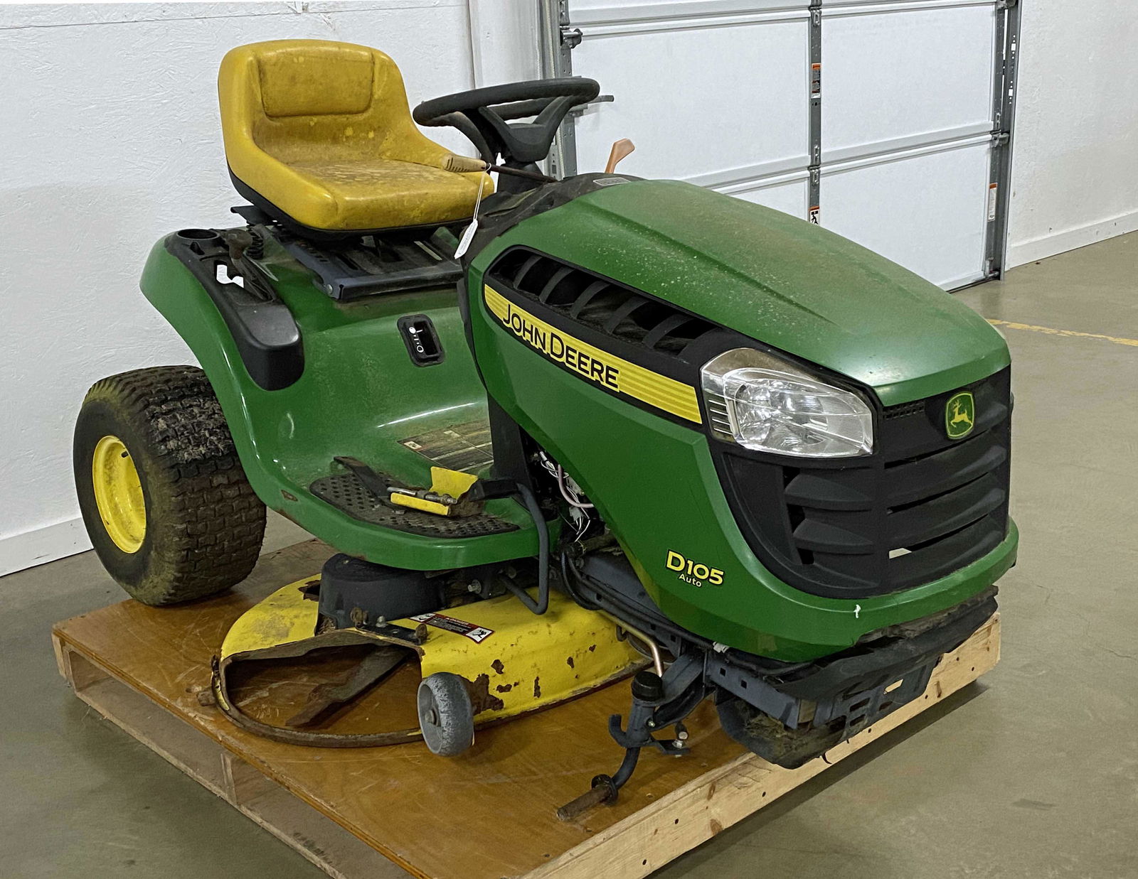 John Deere D105 Riding Mower: John Deere D105 Riding Mower. This mower has approx. 150 hours. Condition- This mower will need repairs. See photos.