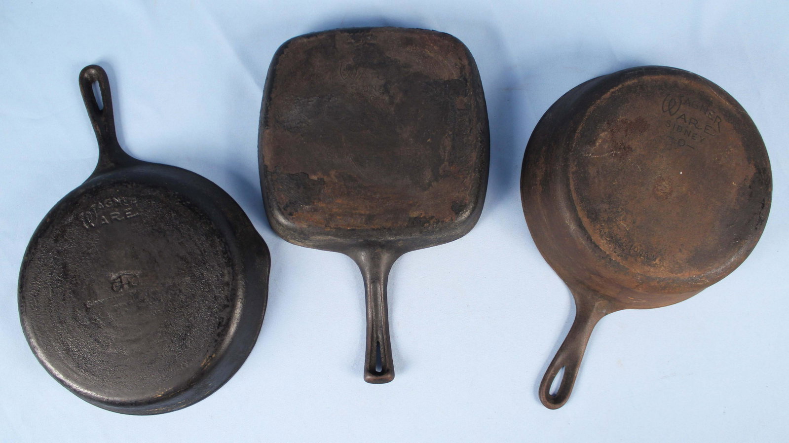 3 Wagner Ware Cast Iron Skillets: 3 Wagner Ware Cast Iron Skillets. (1) 1088 deep chicken fryer. (1) Square skillet. (1)Wagner General Housewares 10" skillet. Condition - Good condition. Need cleaning.